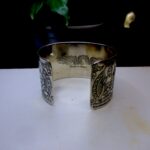 Five Buddha Carved White Metal Bracelet