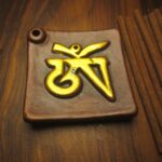 Golden Tibetan Om Clay Incense Holder